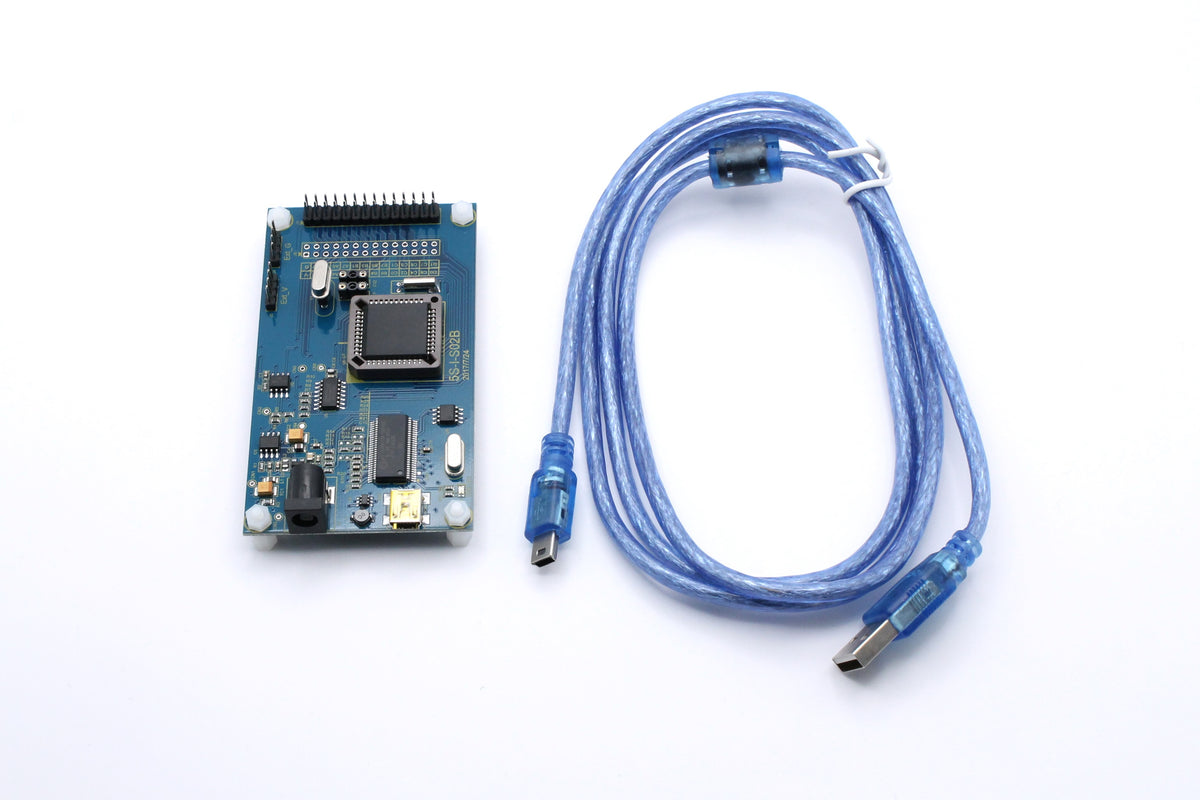 PADAUK 5S-I-S02B emulator board photographed beside a blue USB cable
