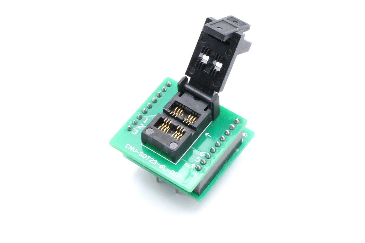 SOT23-6 to DIP programming socket adapter with its hinged lid open, showing gold contacts